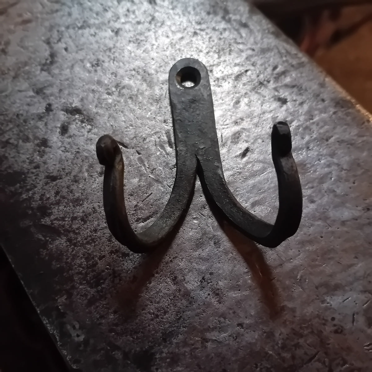 Hand-forged double iron wall hook, view 1