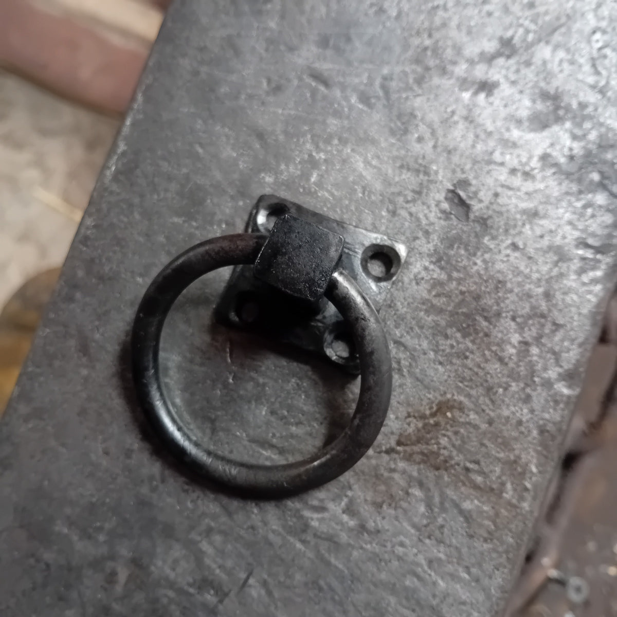 Hand-forged iron ring pull handle, view 1