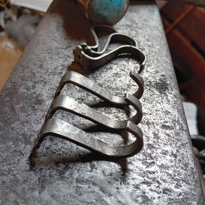 Side profile of hand-forged under-counter steel hooks