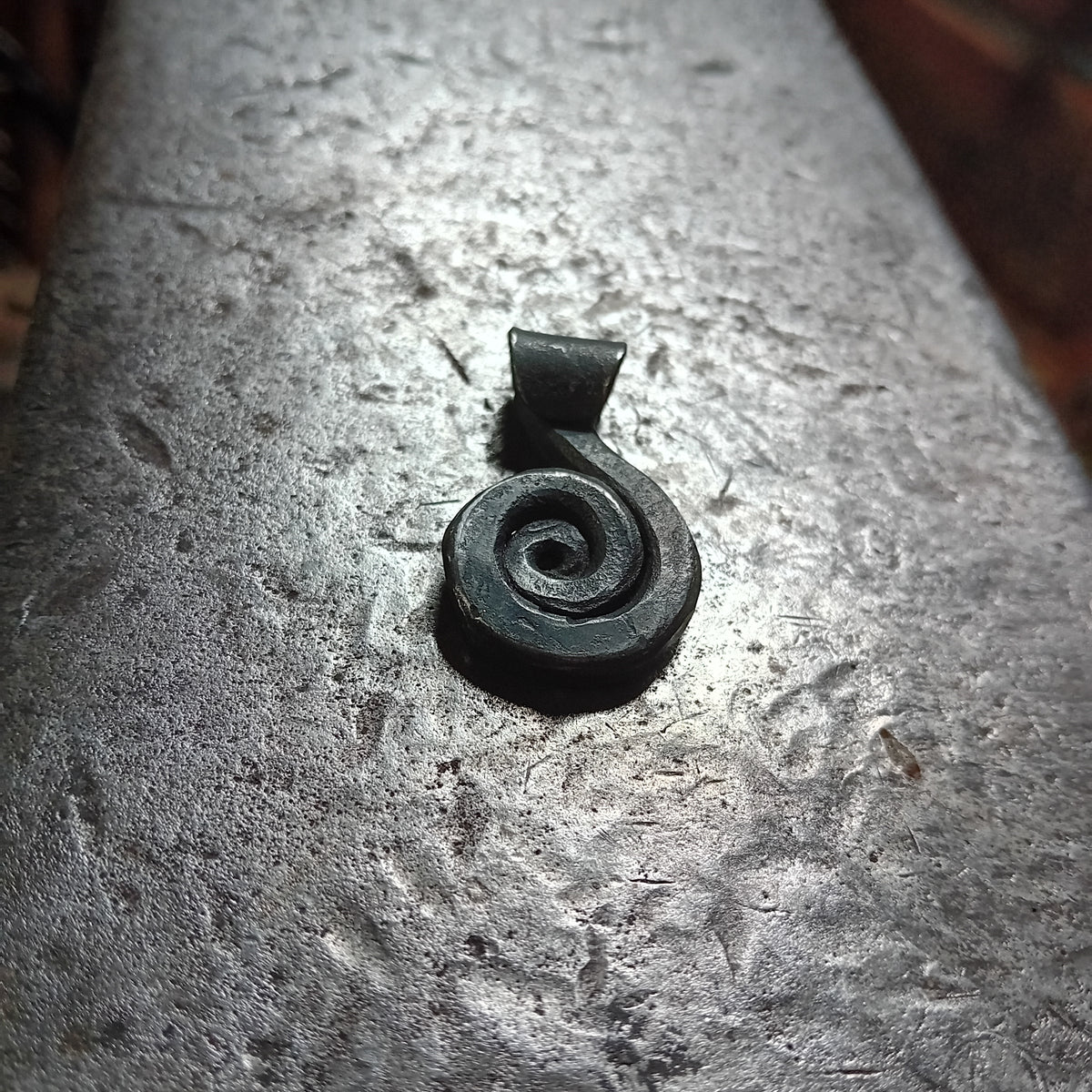 Hand-Forged Steel Sun Spiral Pendant